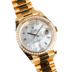Day-Date 40 228398TBR Yellow Gold Mother of Pearl Diamond Baguette Dial and Bezel